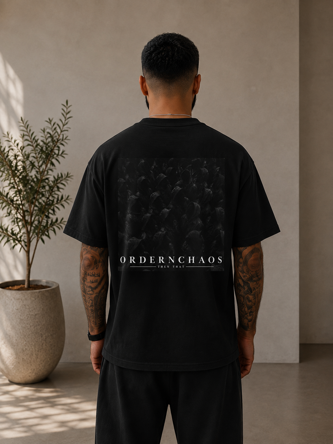 OrderChaos Graphic Tee — Minimalist Black Back Print Shirt